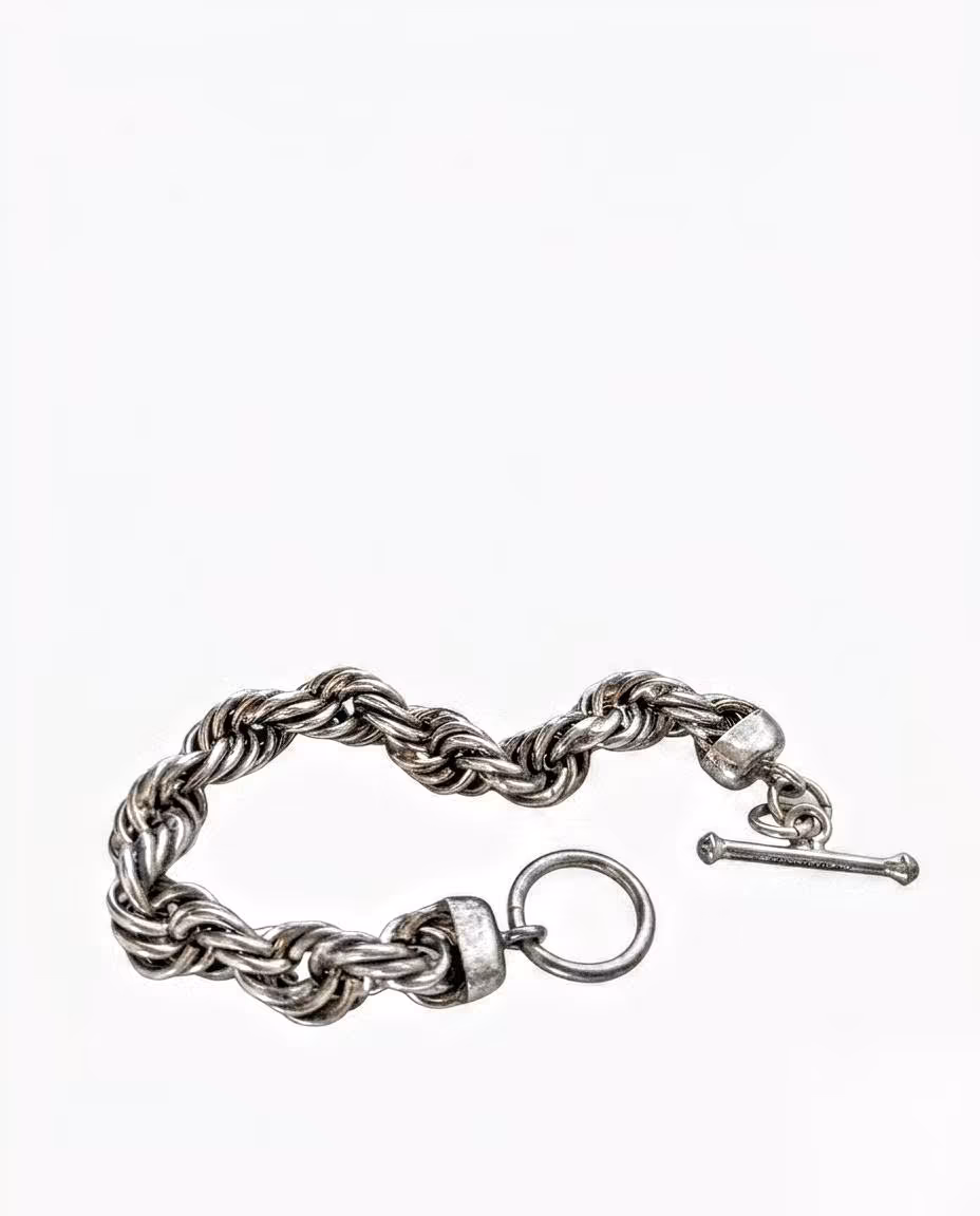 Heavy 925 sterling silver twisted rope chain bracelet with a toggle clasp stamped "925 MEXICO"